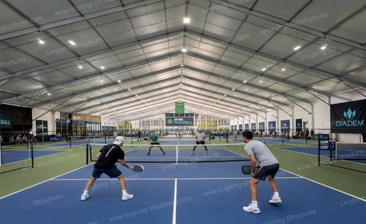 6341787559060255.jpg Community pickleball hall with transparent side walls for natural daylight and open feel