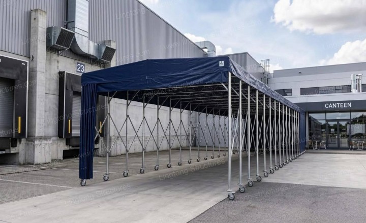 6751787817518298.jpg Retractable storage tent used for factory workshop temporary material storage and staging