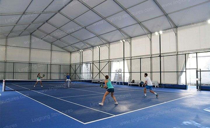 Aluminum frame structure of Padel court tent showing modular assembly and anchoring system