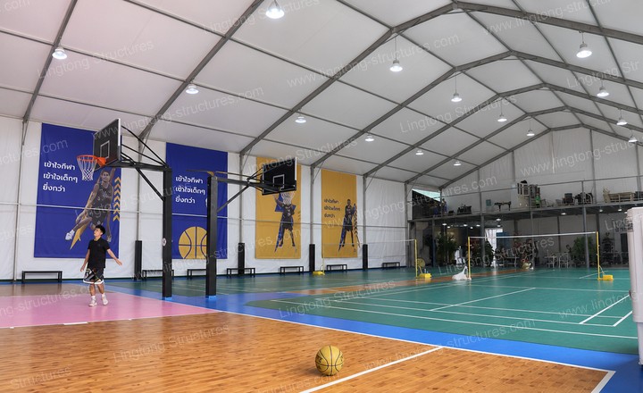 2311789458464949.jpg Exterior of outdoor basketball court tent showing white fabric structure
