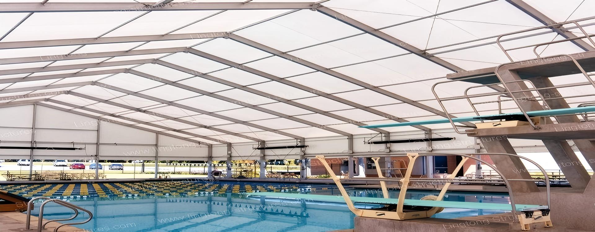 7761788762857515.jpg Swimming pool tent fully enclosing an outdoor pool with aluminum frame and PVC cover for year-round swimming