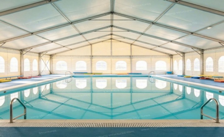 891788762940684.jpg Swimming pool tent installed at resort with full insulation and climate control systems for four-season operation