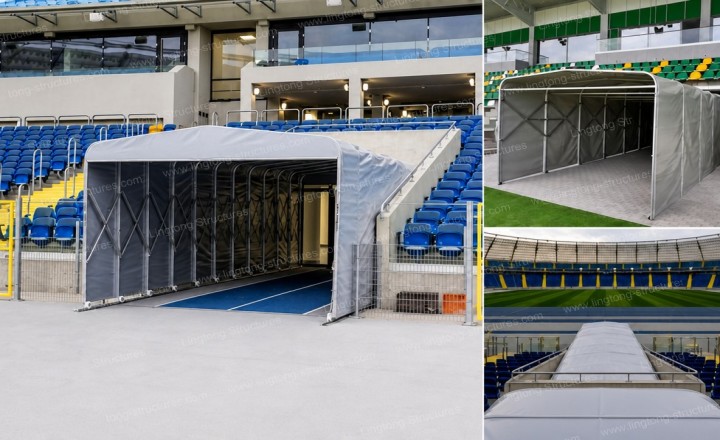 Player tunnel at a sports stadium with custom branding and track system Player tunnel at a sports stadium with custom branding and ground track system for match day use