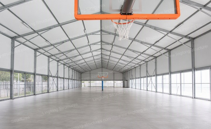 Full-size indoor basketball court inside 20x40m clear-span aluminium sports tent with sports flooring
